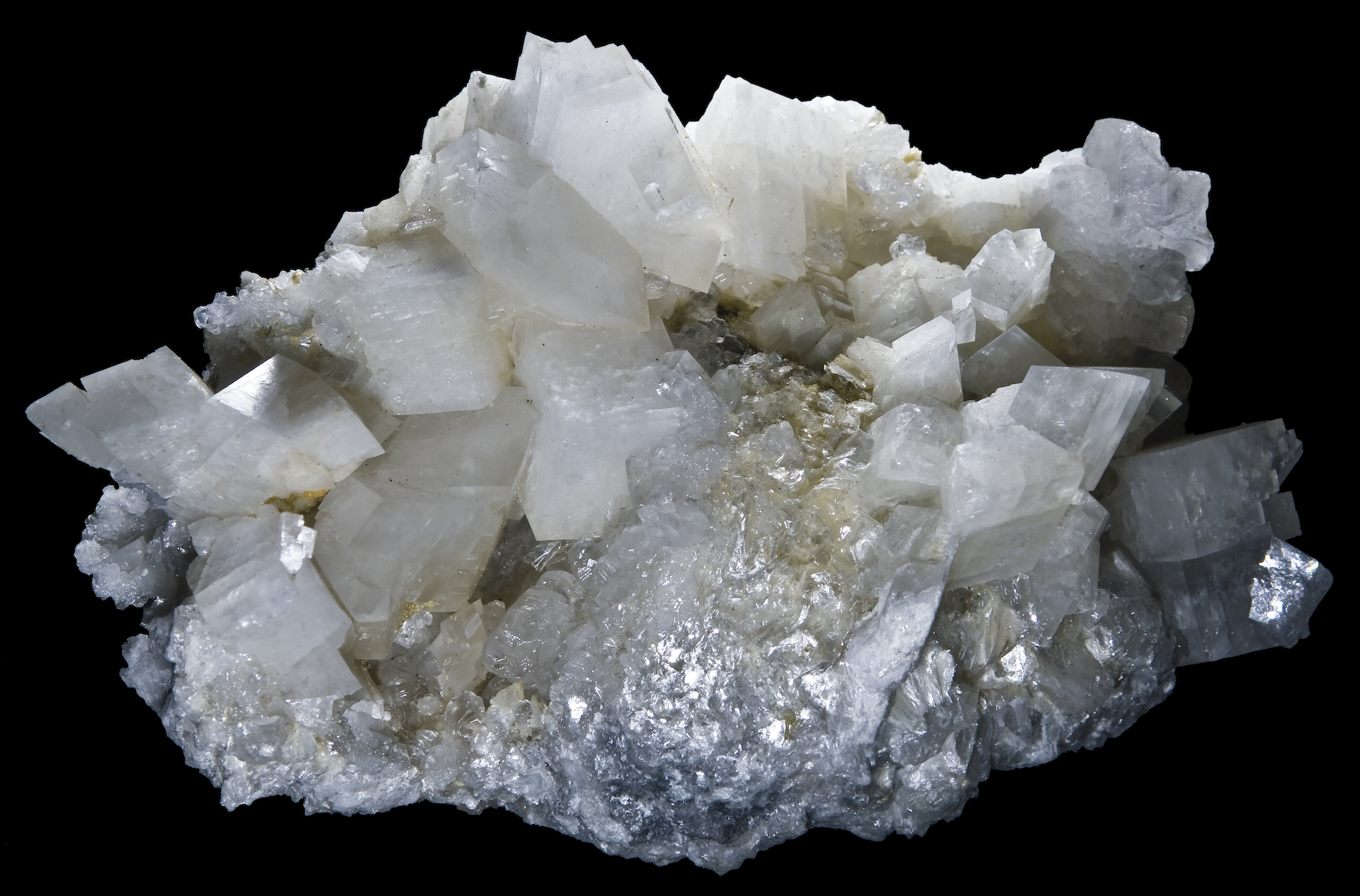 A close up of the dolomite mineral on a black background