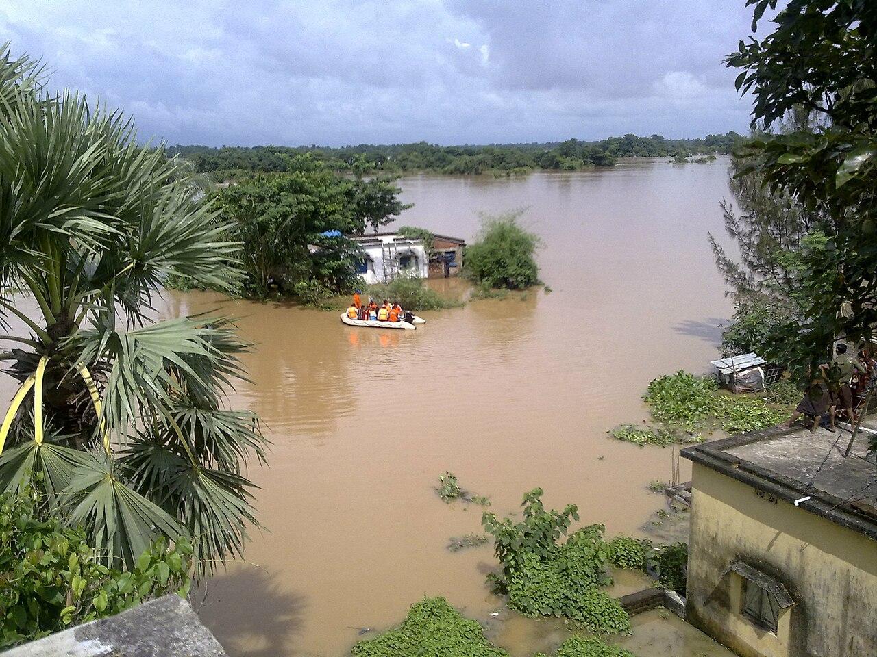 A photograph of a small village after being flooded