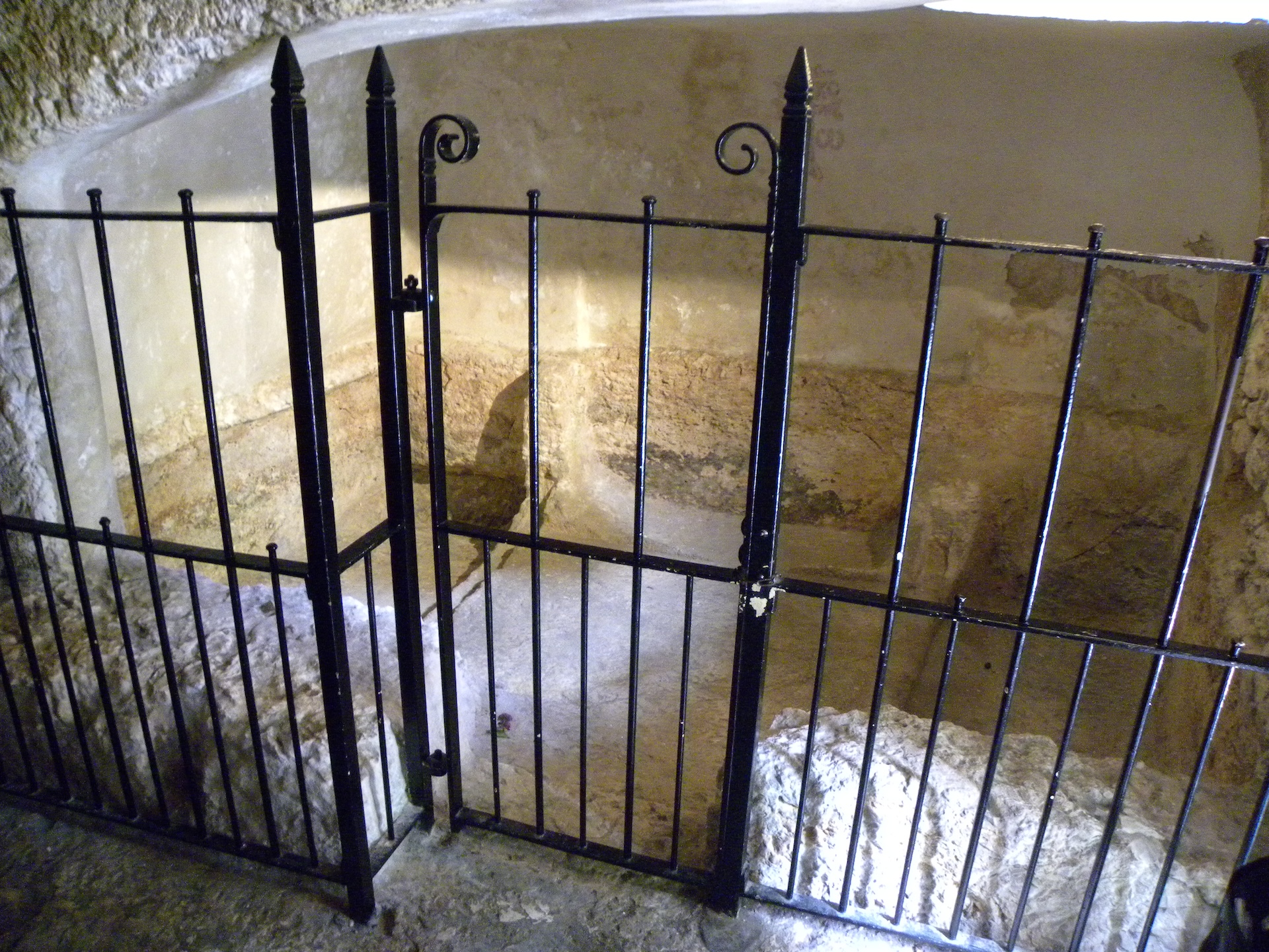 The two hollowed-out burial benches of the so-called "Garden Tomb". This tomb was first proposed in the 19th century as the site of Jesus' burial, in part as an alternative to the Church of the Holy Sepulchre. Unfortunately, it is very doubtful that this was actually Jesus' tomb. Not only was there no ancient tradition associated with this location, but the tomb is not of the correct age. It was originally an ancient Israelite tomb and seems to have gone out of use during the time of Jesus. Hence it was not re-shaped in the distinct "niche" or "kokkhim" pattern of Second Temple Jewish burials. The tomb was then only re-used in the Byzantine period. Nevertheless, a dedicated Protestant group maintains a beautiful garden around the tomb and many (Protestants in particular) find the site more condusive to prayerful reflection than the busy and ornate Church of the Holy Sepulchre. Jerusalem