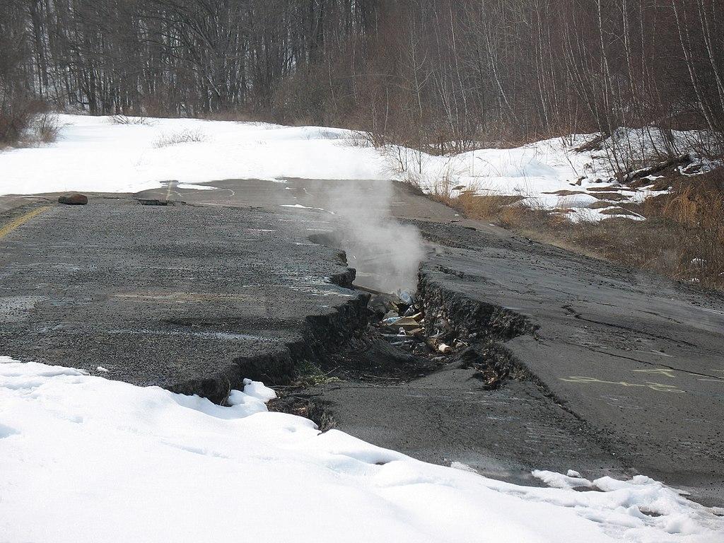 A photograph of smoke emerging from a mine in Pennsylvania