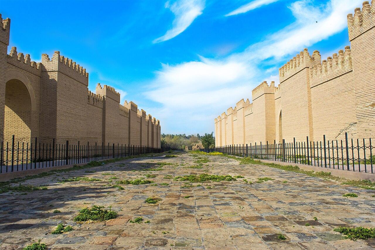 A photograph of a reconstructed Babylonian street in modern Iraq