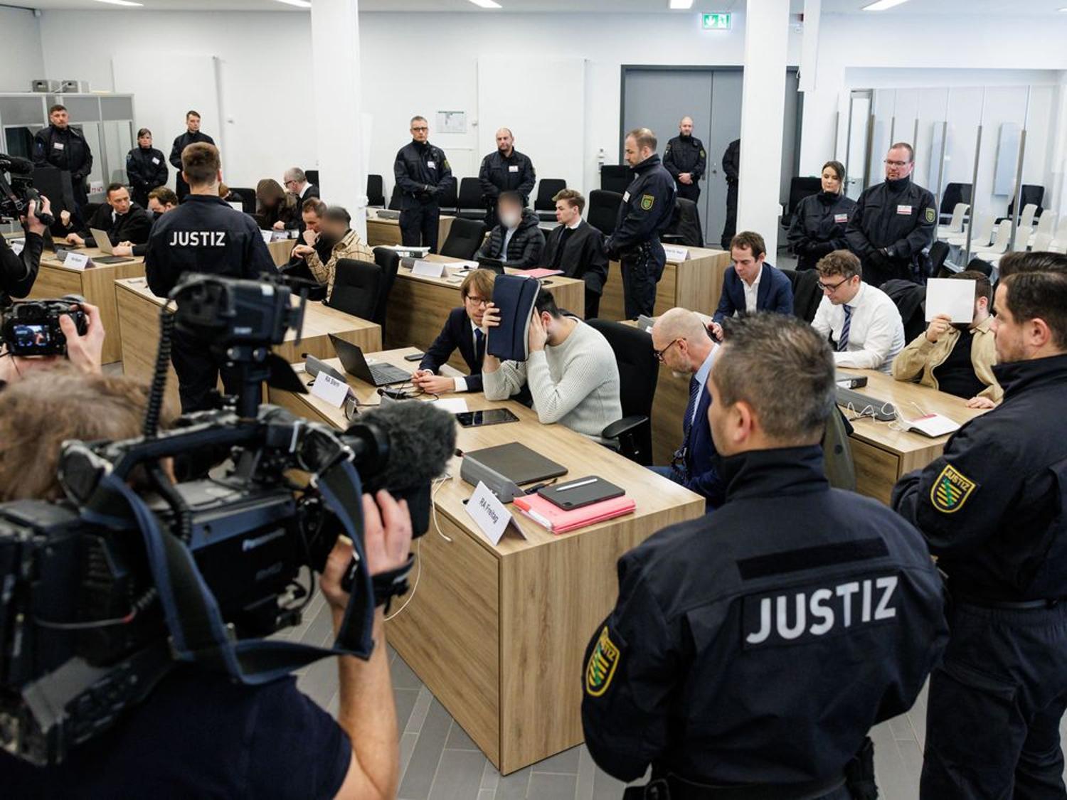 A photograph of the accused men in the Dresden heist in Germany in 2022