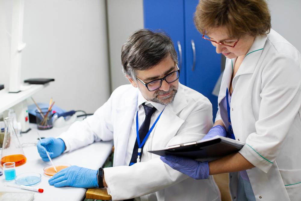 A photograph of two scientists working in their laboratory