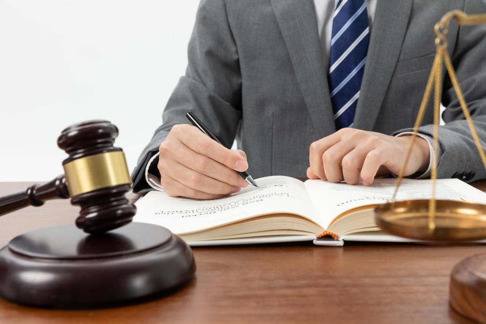 A photograph of a judge working from his desk