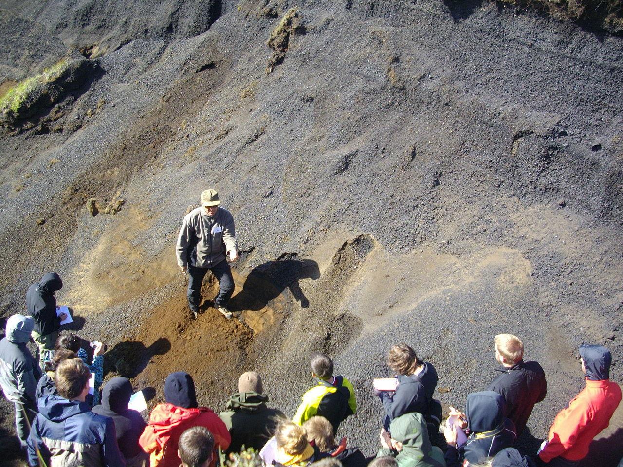 A photograph of a group of geology students in the field