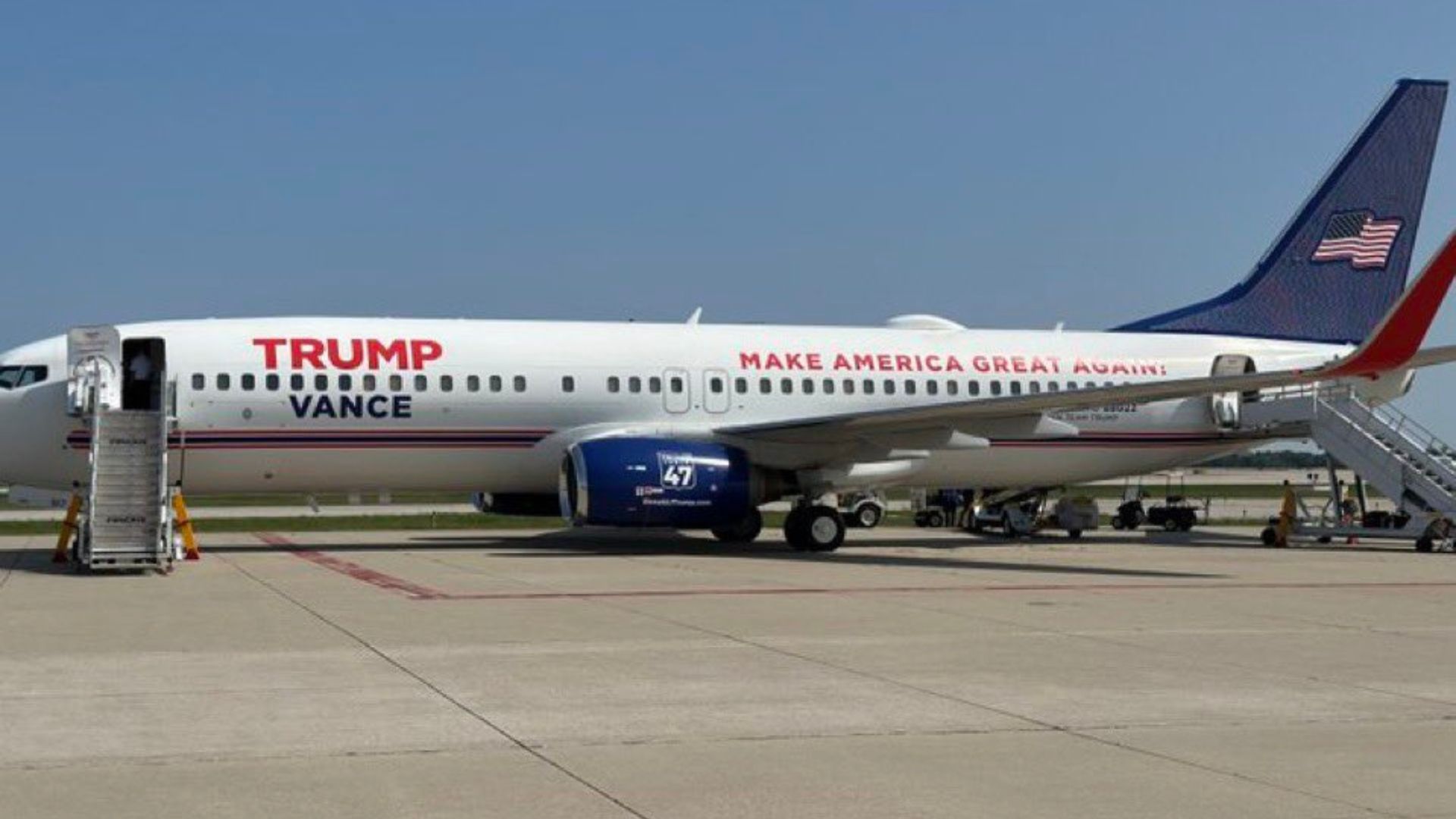A white plane with Trump Vance written on the side and Make America Great Again