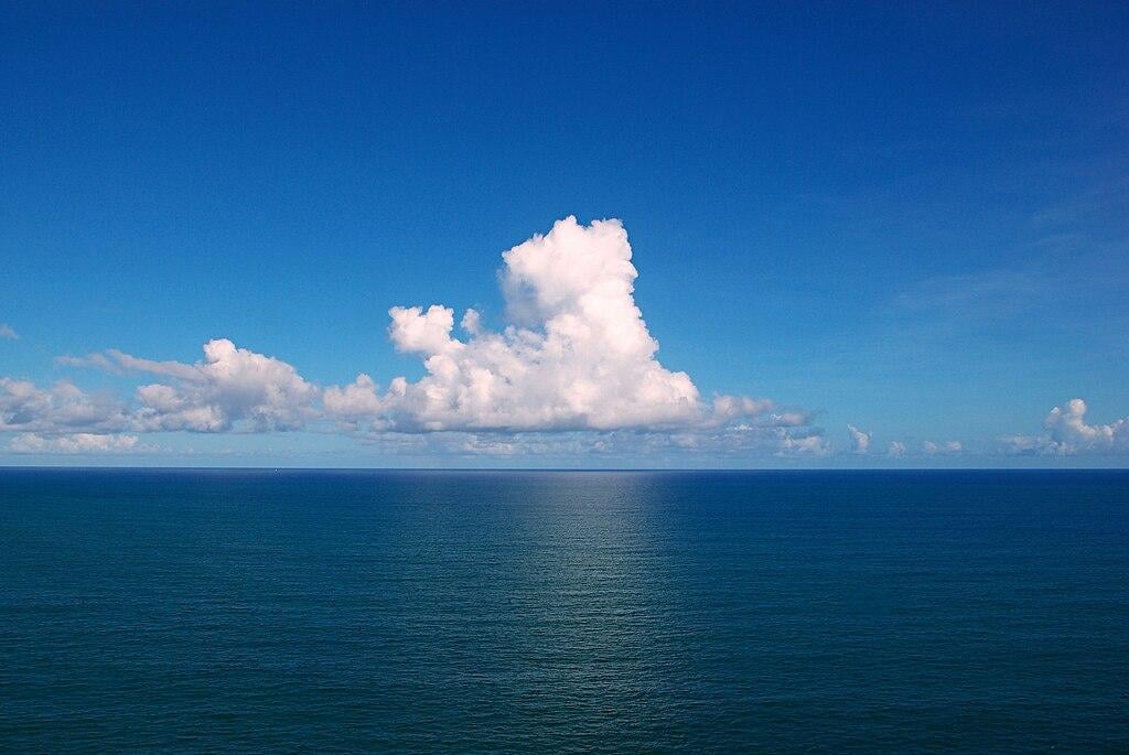 A photograph of the Atlantic Ocean taken on a clear and calm day