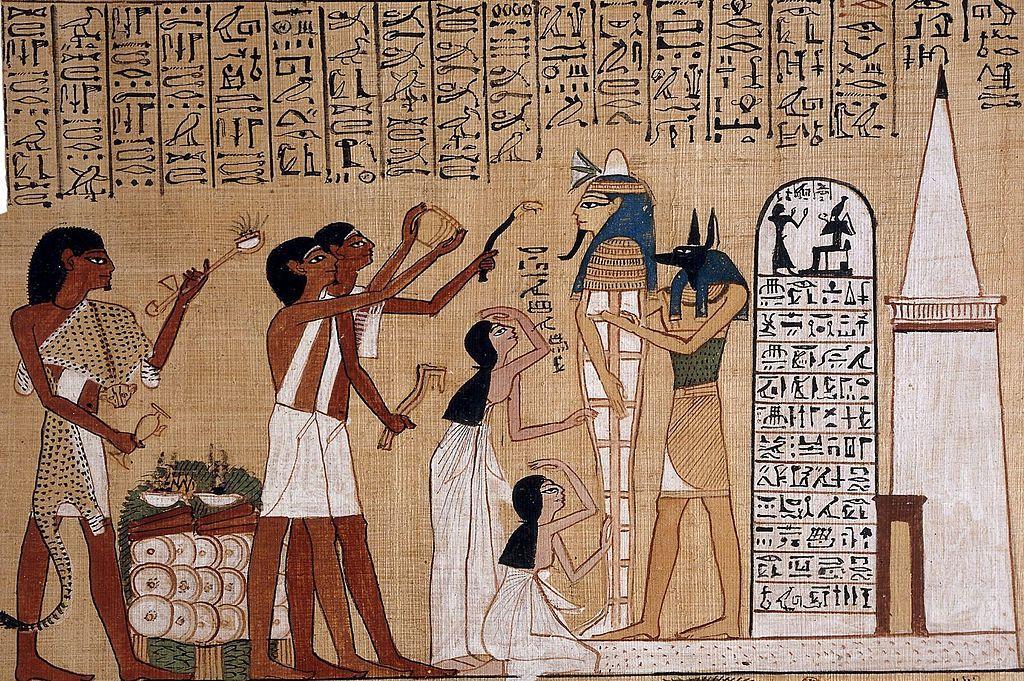A mural depicting the end of the mummification process in Egypt