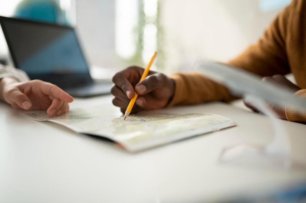 A photograph of several researchers working at their desk