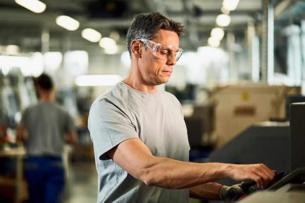 A photograph of a factory worker