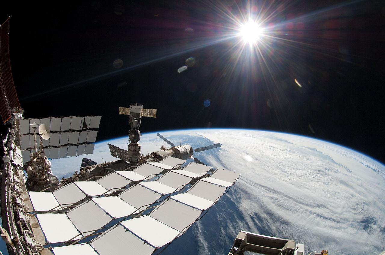 A photograph of the sun shining on Earth