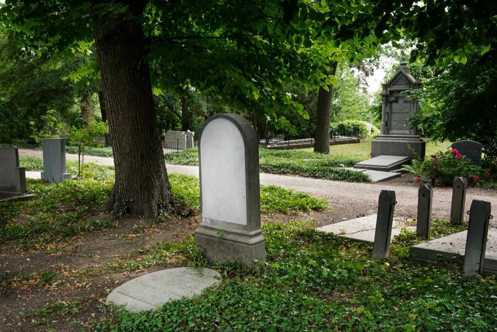 A photograph of a tombstone found in a graveyard