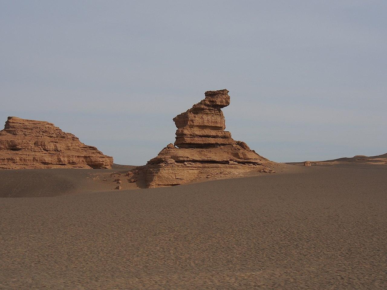 A photograph of a Yardang in a desert
