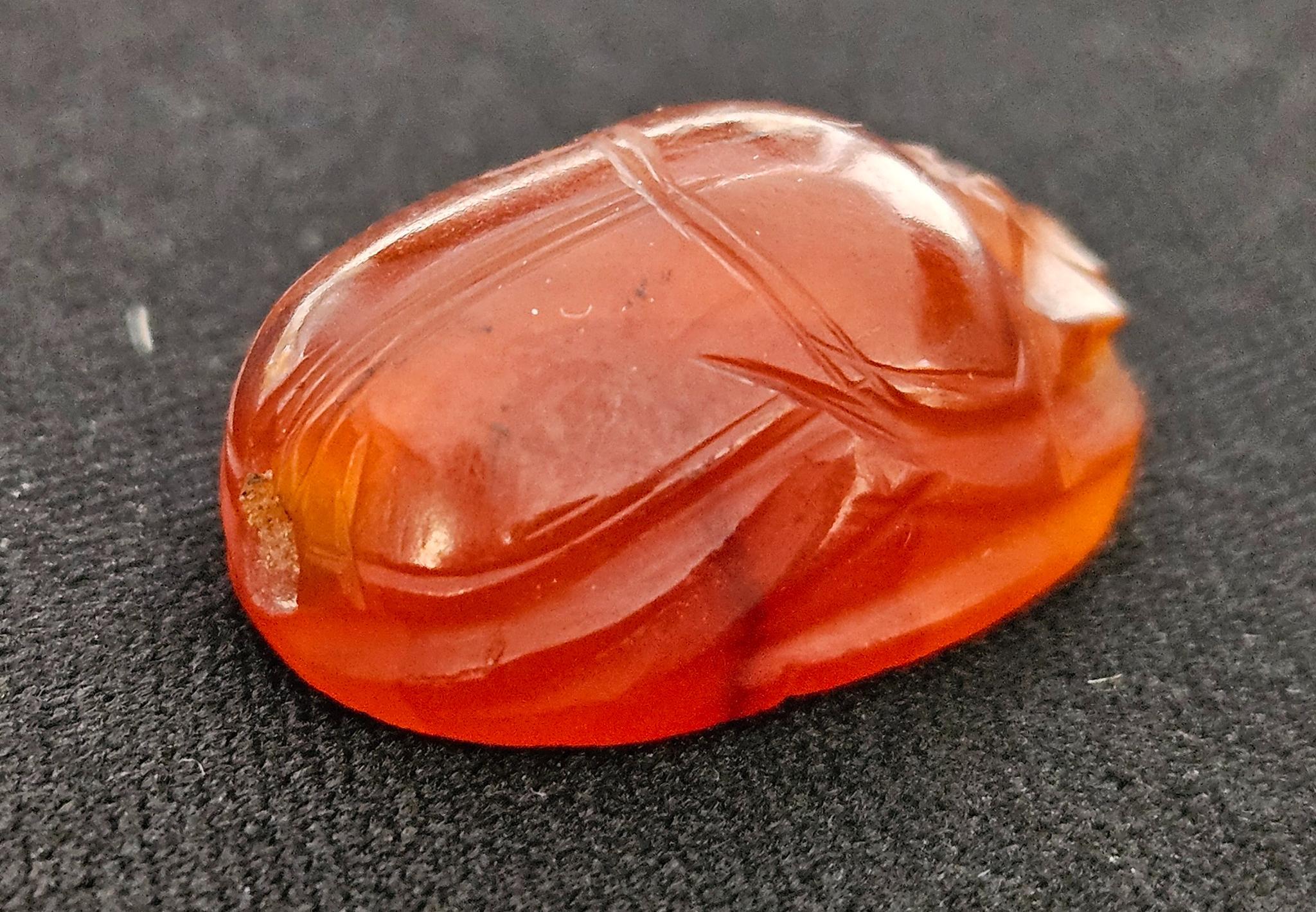 A photograph of the orange-colored scabbard