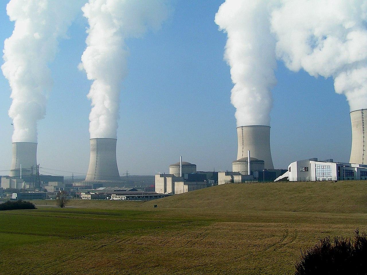 A photograph of a nuclear powerplant releasing steam