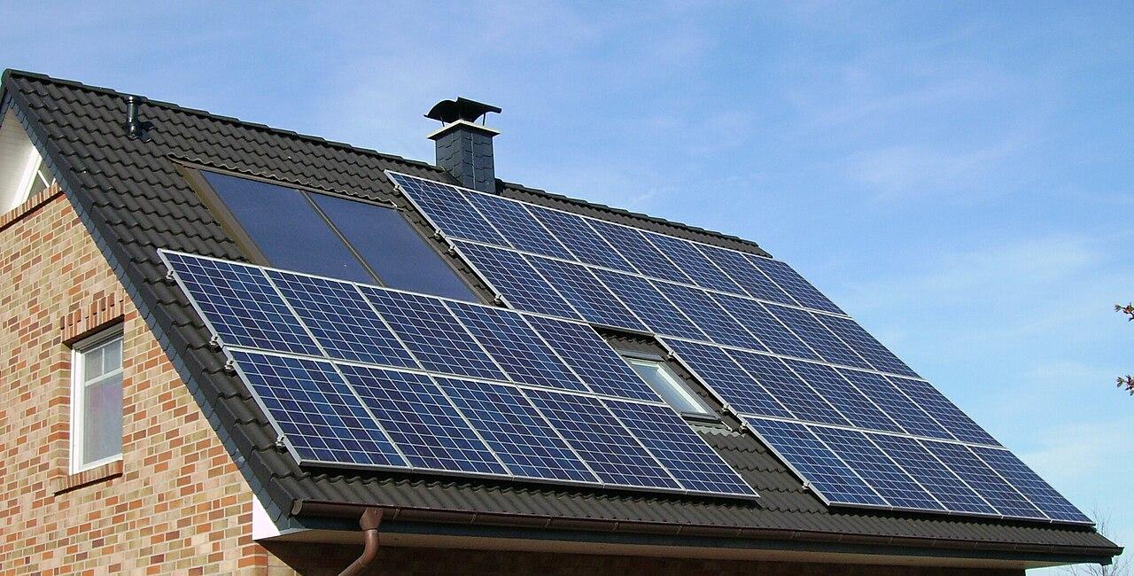 A photograph of solar panels on a roof